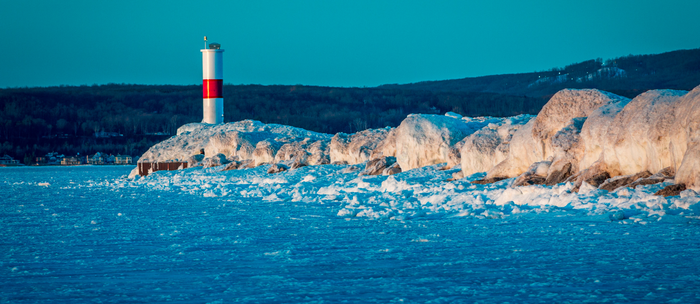 winter view of Little Traverse Bay and lighthouse
